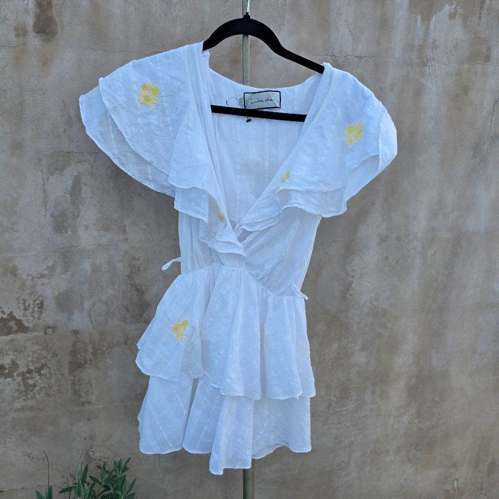 Innika choo white ruffled mini dress with flower